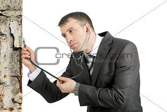 Businessman with stethoscope