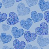 Seamless pattern with doddle hearts in blue colors