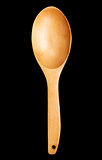 Wooden spoon on black