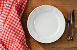 White Plate and Cutlery - Table and Tablecloth