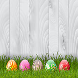 Easter eggs on a wood background 