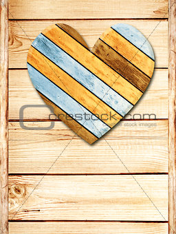 Wooden heart on old wood wall