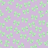 Seamless vector pattern with pastel  bows on a tile  background.
