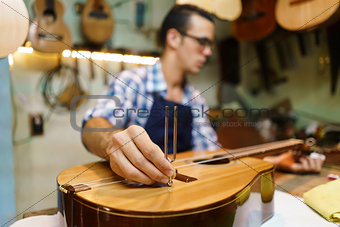 Artisan Lutemaker Tuning Handmade Classic Guitar With Diapason