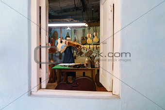 Lute Maker Checking Classic Guitar In Atelier Of Music Instrumen