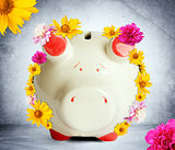Piggy bank with flowers
