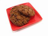 chocolate cookies on a red plate