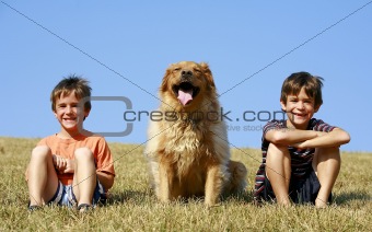 Boys and Dog on a Hill