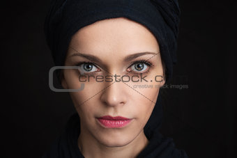young girl with clean skin on a black background