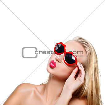 Girl in lips shaped sunglasses