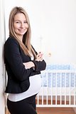 Pregnant businesswoman expecting a baby