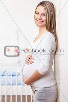 Young and happy pregnant woman