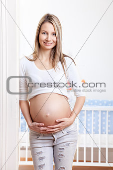 Young and happy pregnant woman