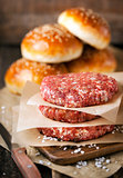 Raw ground beef meat steak cutlets and burger buns 