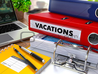Red Ring Binder with Inscription Vacations.