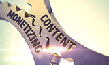 Golden Metallic Cogwheels with Content Monetizing Concept.
