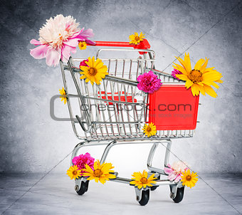Shopping cart with flowers