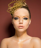 woman with cute golden make-up 