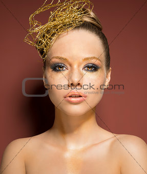 woman with cute golden make-up 