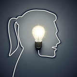 light bulb inside a female head 