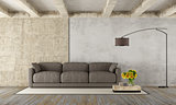 Grunge room with modern sofa
