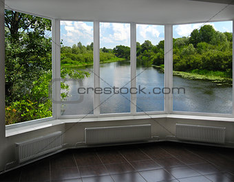 modern window of veranda overlooking the river 
