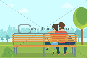 Couple outdoors in the park sitting on bench and looking forward