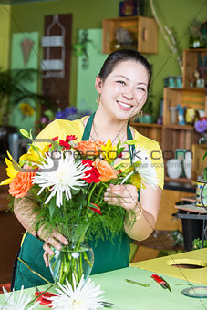 Flower Shop Worker Making Arrangement