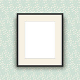 Blank picture frame on vintage style wallpaper