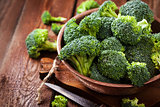 Fresh raw green broccoli in bowl
