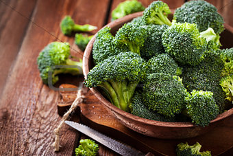 Fresh raw green broccoli in bowl