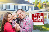 Family In Front of For Sale By Owner Sign, House