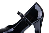 Close-up shot of black shoe with strap belt 
