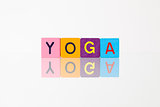 Yoga - an inscription from children's blocks