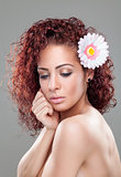 Beautiful woman with red curly hair