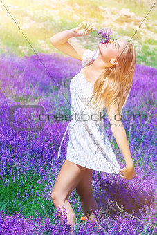Beautiful woman on lavender field