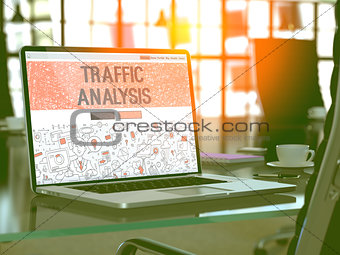Traffic Analysis on Laptop in Modern Workplace Background.