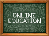 Online Education - Hand Drawn on Green Chalkboard.