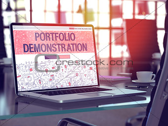 Portfolio Demonstration on Laptop in Modern Workplace Background.