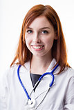 doctor woman smiling and has red hair