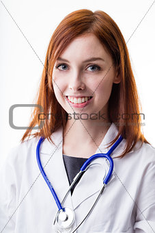 doctor woman smiling and has red hair
