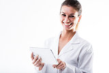 laughing or smiling scientist with a digital tablet