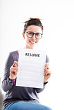 smiling woman showing a resume