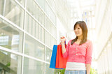 Asian woman with shopping bags