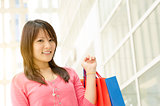 Asian girl with shopping bags