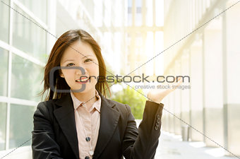 Asian business woman hand holding somethings