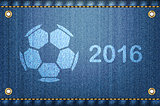 Soccer ball on blue jeans background