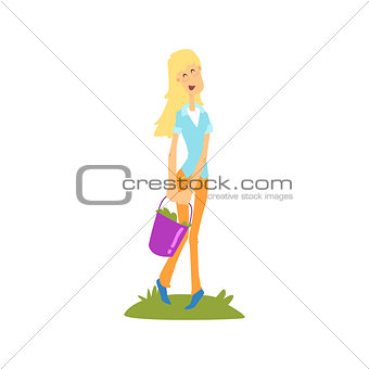 Girl Carrying Bucket Of Vegetables