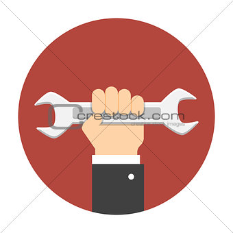 Man hand holding wrench