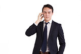 Happy young Caucasian business man holding a mobile phone